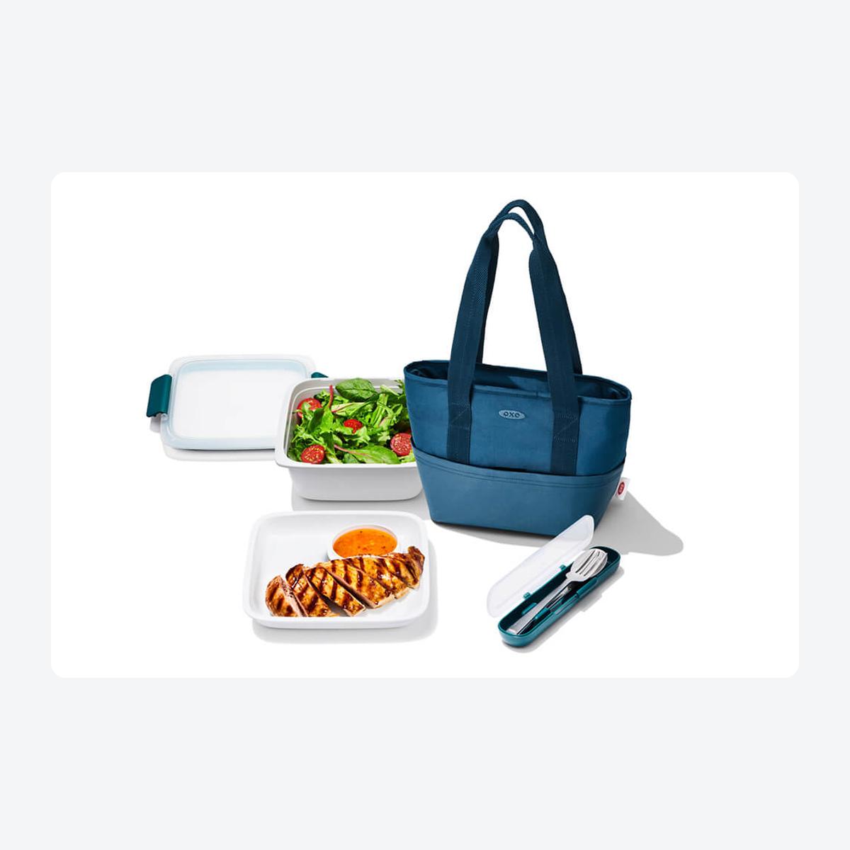 OXO Good Grips Prep and Go Insulated Lunch Tote in blue, official campaign photo with Prep and Go containers and cutlery case in frame
