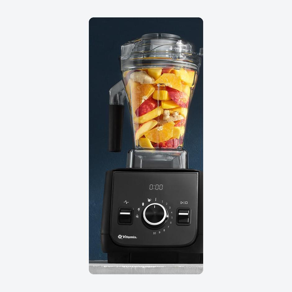 Vitamix Ascent X2 blender in black with its 48-ounce container filled with cut fruit